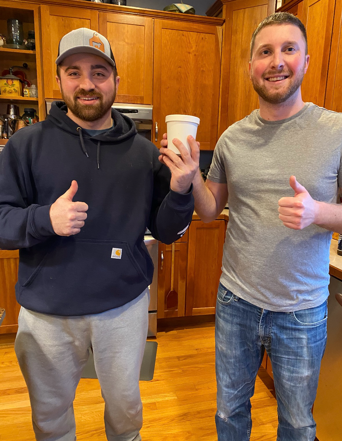 Kevin and Jamieson with one of their early ice cream containers
